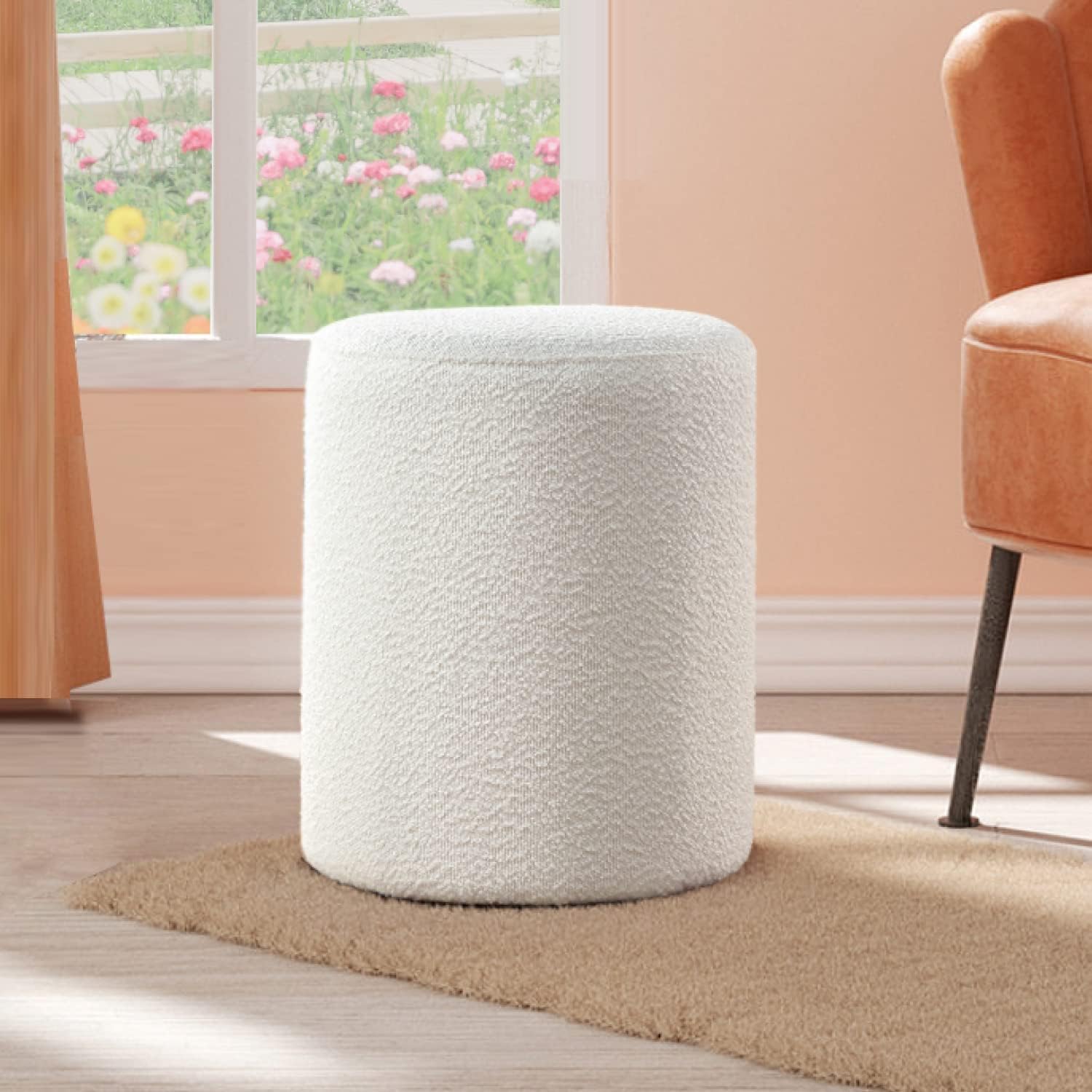 White bouclé round ottoman